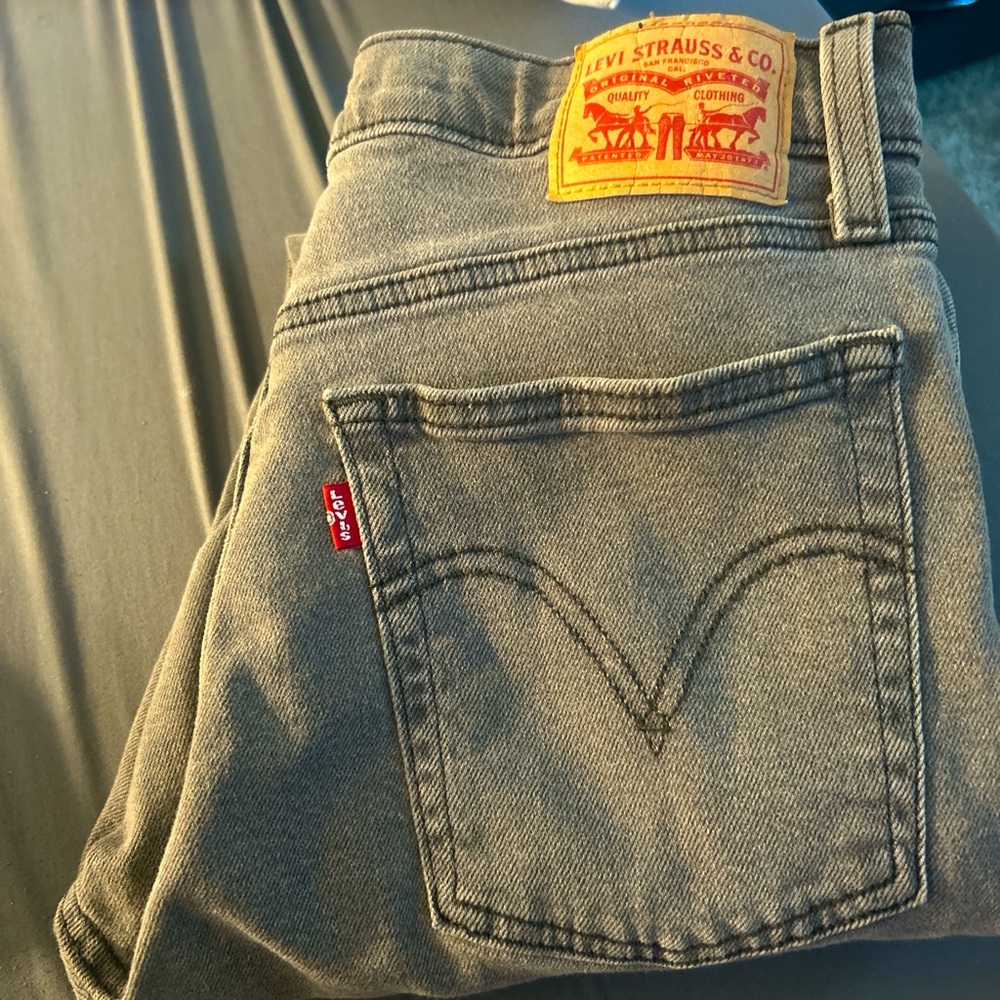Women’s grey Levi jeans